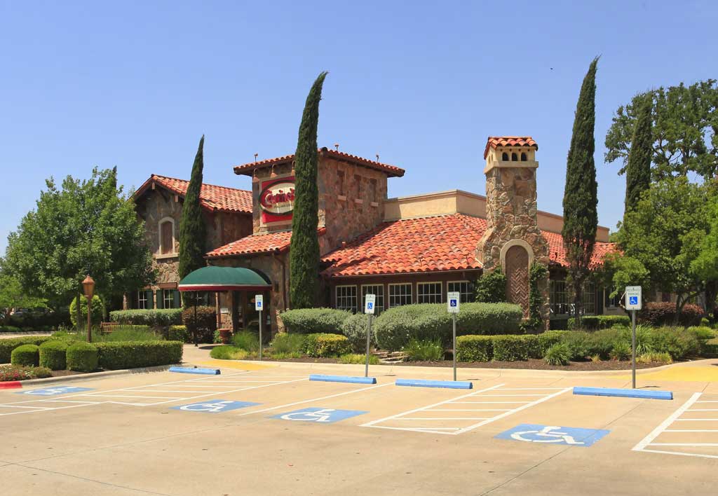 Former Johnny Carino’s restaurant building in Cedar Park Texas with existing commercial kitchen and restaurant layout